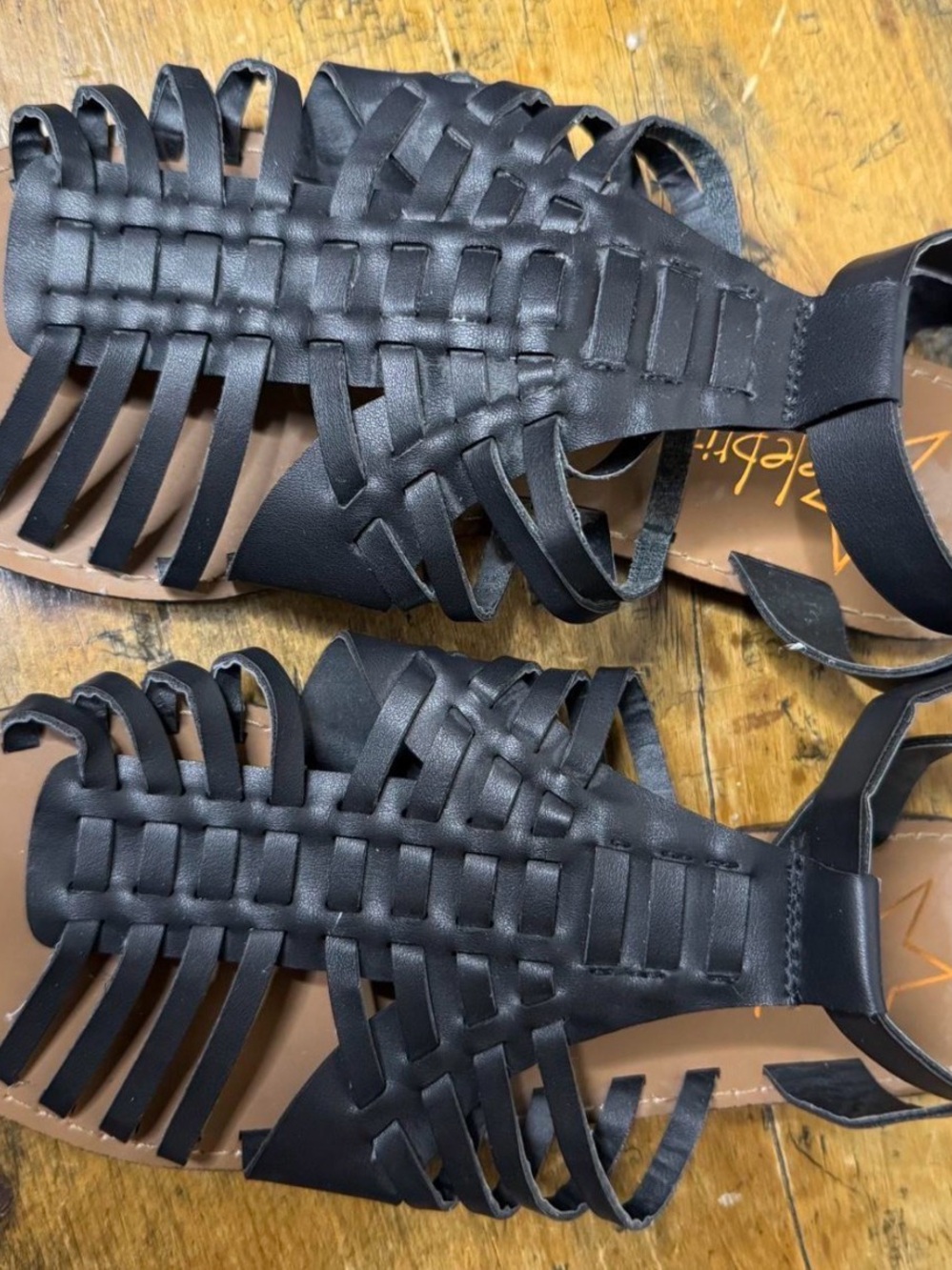 Celebrity Black Woven Gladiator Sandals